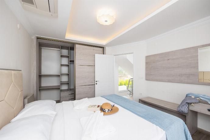 Double bedroom with A/C . - Orka World Villa 2 . (Photo Gallery) }}