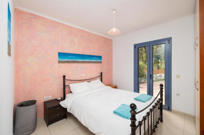 Double bedroom with A/C and TV . - Villa Nisyros . (Photo Gallery) }}