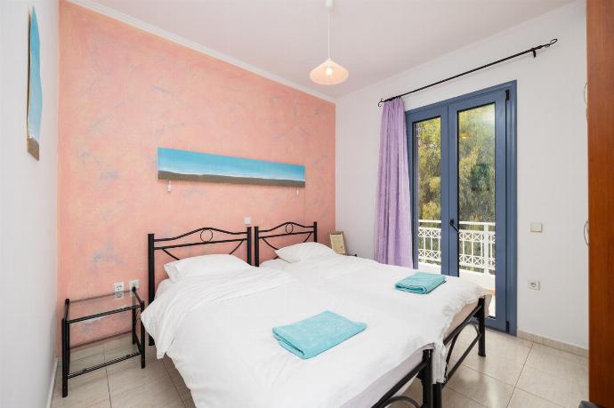 Twin bedroom with A/C . - Villa Nisyros . (Photo Gallery) }}