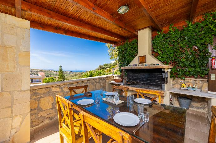 Sheltered terrace area with BBQ . - Villa Katia Faragi . (Photo Gallery) }}