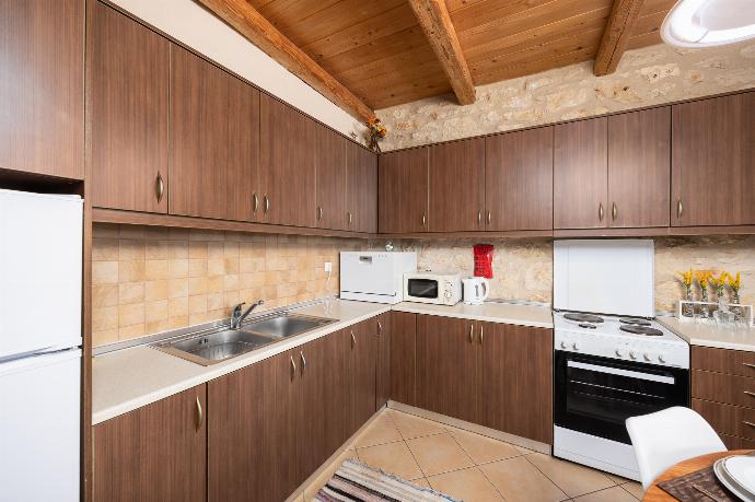 Equipped kitchen . - Villa Katia Faragi . (Photo Gallery) }}