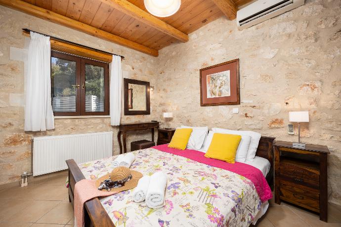 Double bedroom with A/C . - Villa Katia Faragi . (Photo Gallery) }}