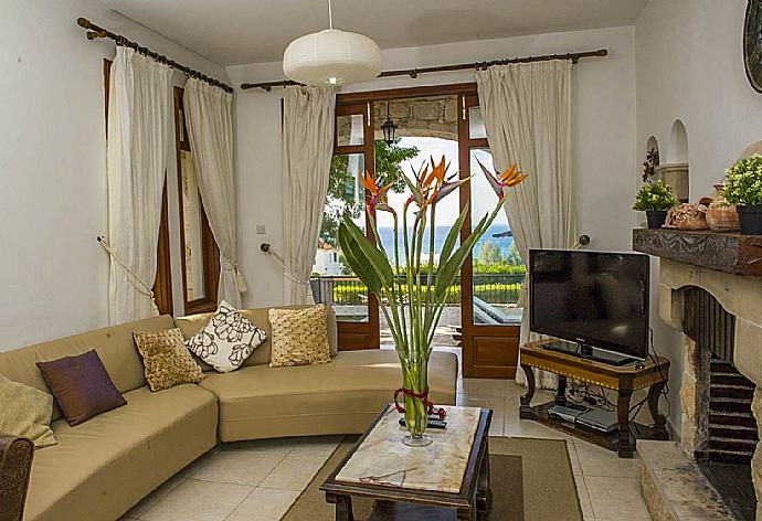 Living area with TV  . - Villa Minoas . (Photo Gallery) }}