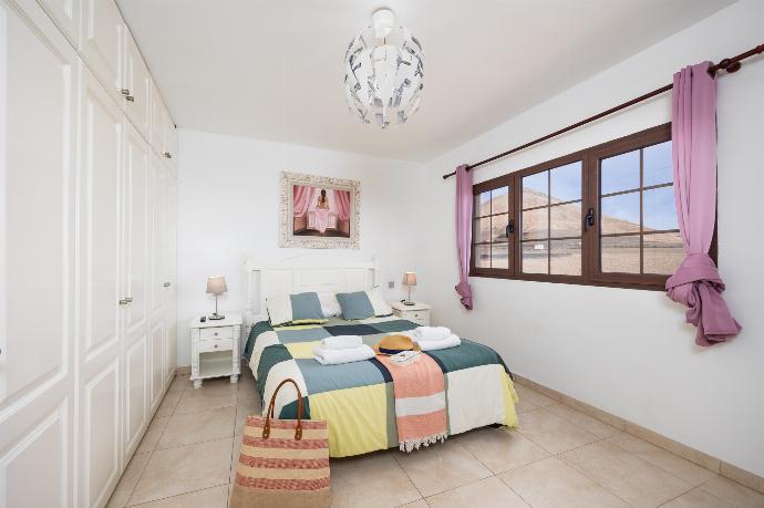 Double bedroom with en suite bathroom . - Villa Santana . (Photo Gallery) }}