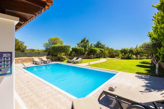 Private pool, terrace, and garden with sea views . - Villa Mediterranean Blue . (Photo Gallery) }}