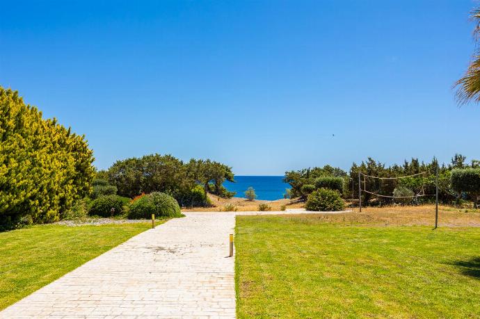 Walkway to beach . - Villa Pelagos Blue . (Photo Gallery) }}