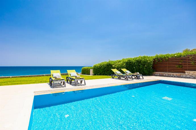 Private pool, terrace, and garden with sea views . - Villa Lahania . (Photo Gallery) }}