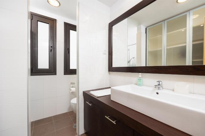 En suite bathroom with shower . - Villa Lahania . (Photo Gallery) }}
