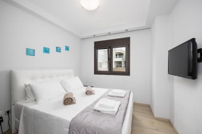 Double bedroom with A/C and TV . - Villa Metis . (Photo Gallery) }}