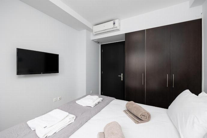 Double bedroom with A/C and TV . - Villa Metis . (Photo Gallery) }}