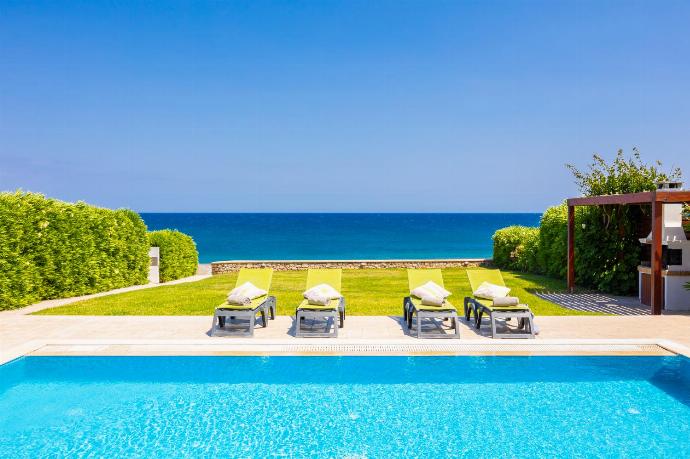 Private pool, terrace, and garden with panoramic sea views . - Villa Tsampikos . (Photo Gallery) }}
