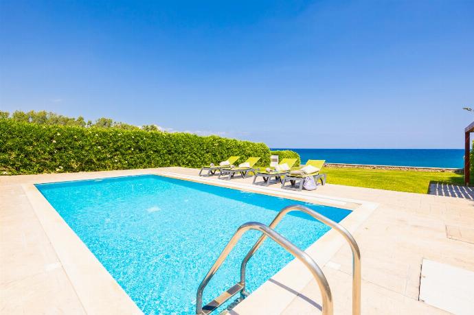 Private pool, terrace, and garden with panoramic sea views . - Villa Tsampikos . (Photo Gallery) }}