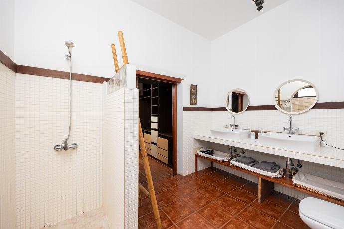 En suite bathroom with bath and shower . - Villa Vista Mar . (Photo Gallery) }}