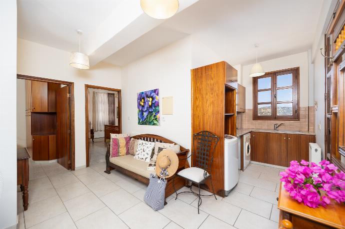 Living area on second floor with sofa and kitchenette . - Villa Irene Palace . (Galerie de photos) }}