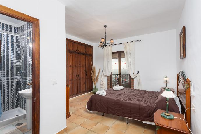 Double bedroom with en suite bathroom and A/C . - Villa Benizan . (Photo Gallery) }}