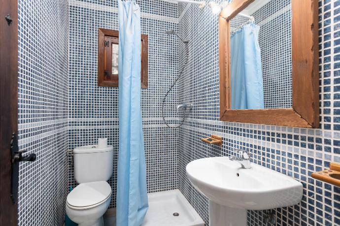 En suite bathroom with shower . - Villa Benizan . (Photo Gallery) }}