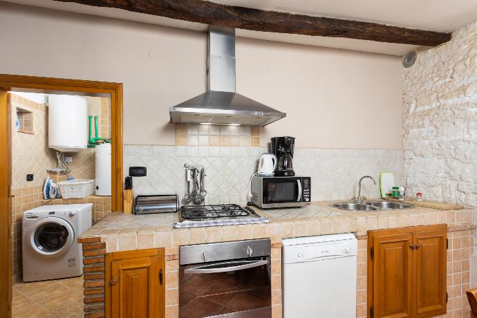 Equipped kitchen on ground floor . - Villa Damiana . (Photo Gallery) }}