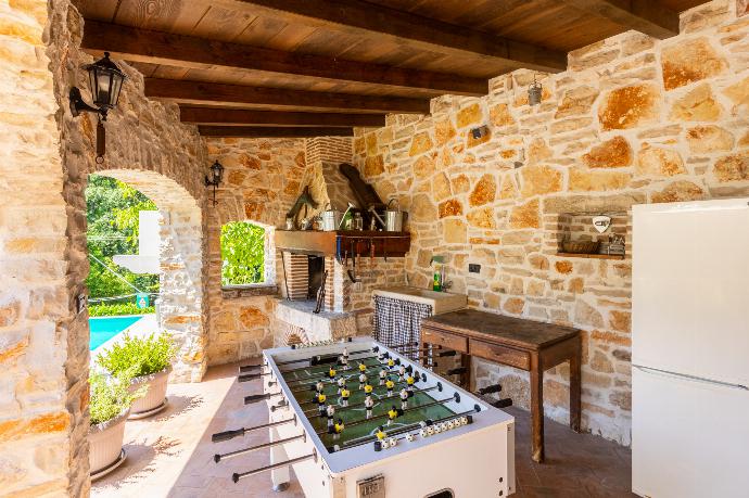 Sheltered terrace area with BBQ . - Villa Damiana . (Photo Gallery) }}