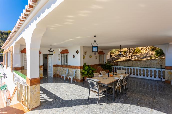 Sheltered terrace area with BBQ and sea views . - Villa Casa Leo . (Photo Gallery) }}