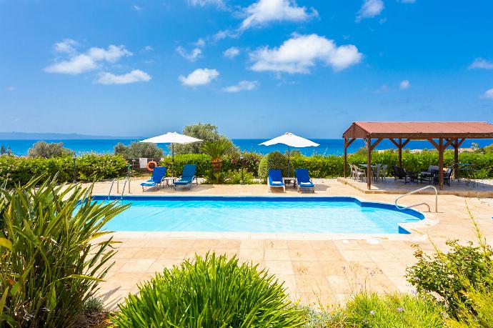 Private pool, terrace, and garden with sea views . - Villa Erato . (Photo Gallery) }}