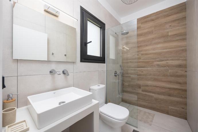 En suite bathroom with shower . - Villa Petra . (Photo Gallery) }}