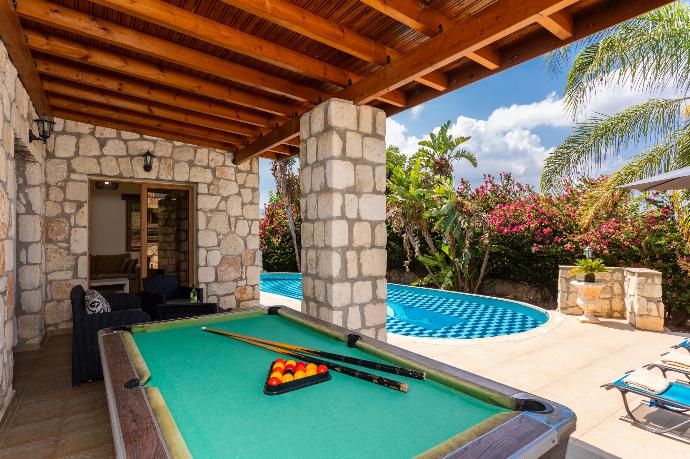 Sheltered terrace area with pool table  . - Villa Windmill . (Photo Gallery) }}