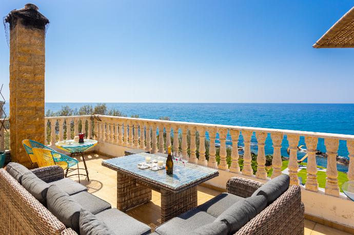 Terrace area with sea views . - Villa Beach Heaven . (Photo Gallery) }}