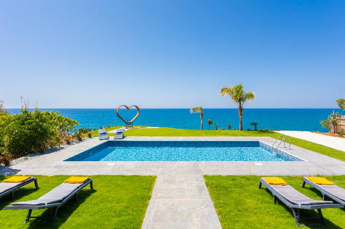 Private pool and terrace with panoramic sea views . - Villa Beach Heaven . (Photo Gallery) }}