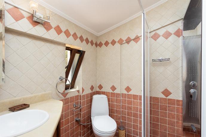 En suite bathroom with shower . - Villa Elounda Blue . (Photo Gallery) }}