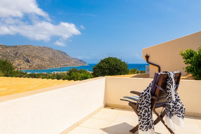 Roof terrace with sea views . - Villa Elounda Blue . (Photo Gallery) }}