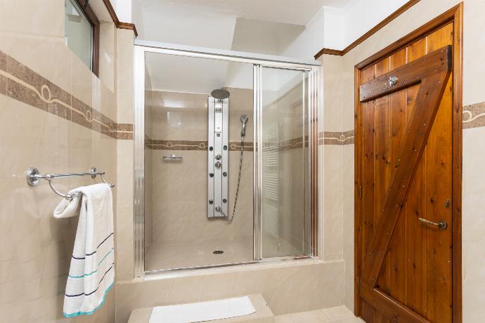 Family bathroom with shower . - Villa Elounda Blue . (Photo Gallery) }}