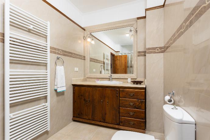 Family bathroom with shower . - Villa Elounda Blue . (Photo Gallery) }}