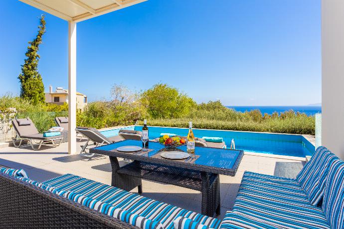 Sheltered terrace area with panoramic sea views . - Villa Panorama . (Photo Gallery) }}