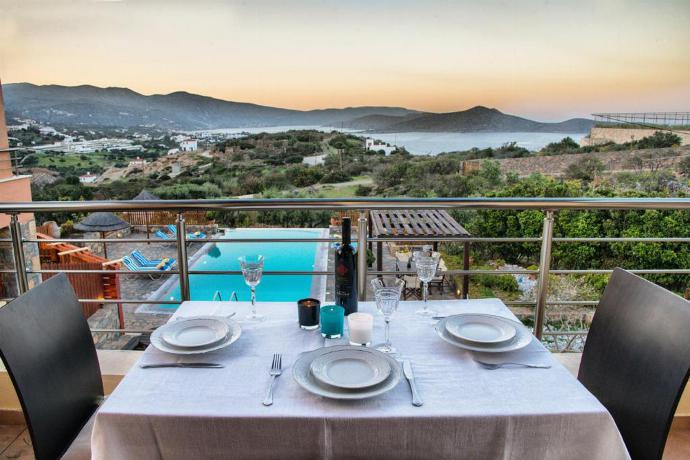 Outdoor dining area with beautiful panoramic view . - Villa Glan Y Mor . (Photo Gallery) }}