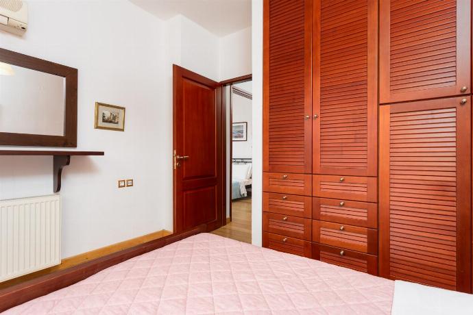 Double bedroom with A/C . - Villa Glan Y Mor . (Photo Gallery) }}