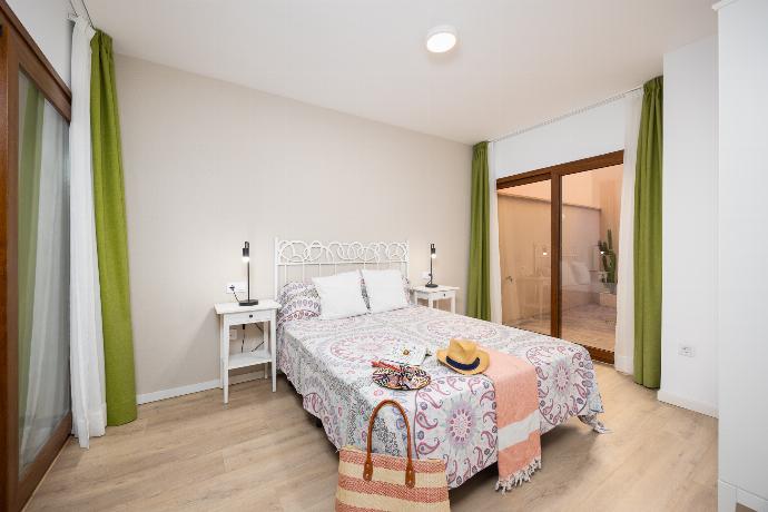 Double bedroom with A/C . - Villa Mariposas Caleta . (Photo Gallery) }}