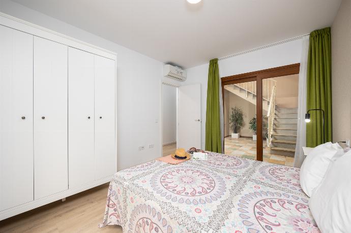 Double bedroom with A/C . - Villa Mariposas Caleta . (Photo Gallery) }}