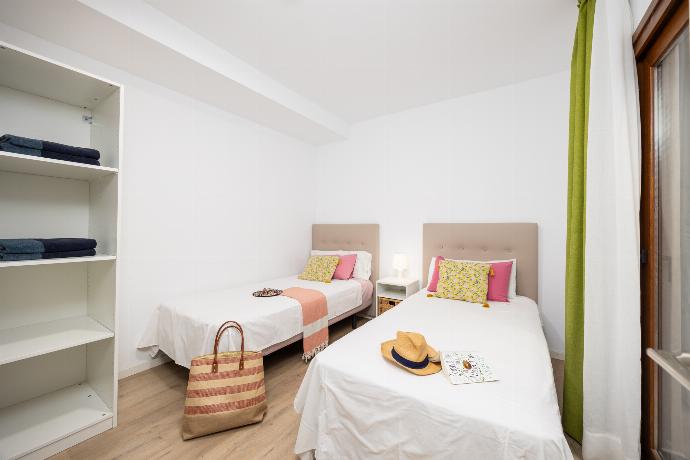 Twin bedroom with A/C . - Villa Mariposas Caleta . (Photo Gallery) }}