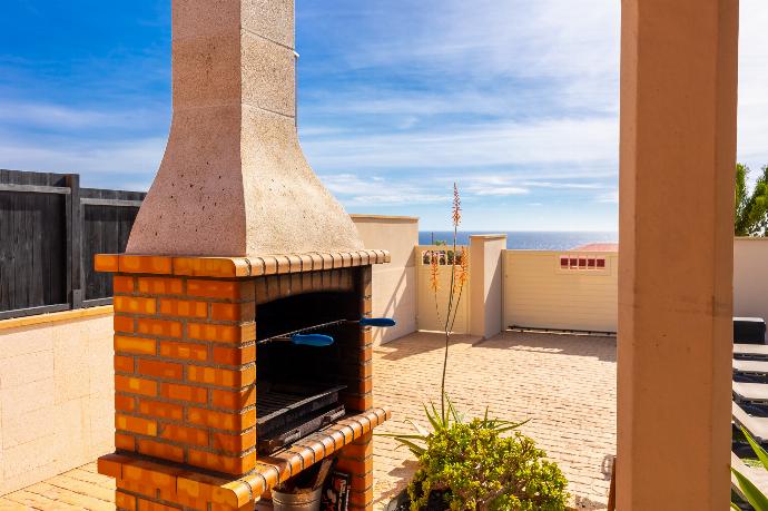 BBQ area . - Villa Mariposas Caleta . (Photo Gallery) }}