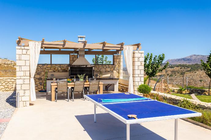 Terrace area with table tennis . - Villa Marielia . (Photo Gallery) }}