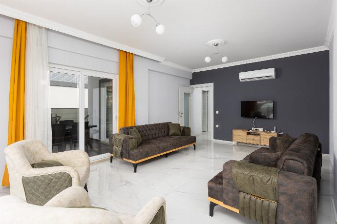 Living room with sofas, A/C, WiFi internet, and satellite TV . - Villa Sasha 1 . (Photo Gallery) }}