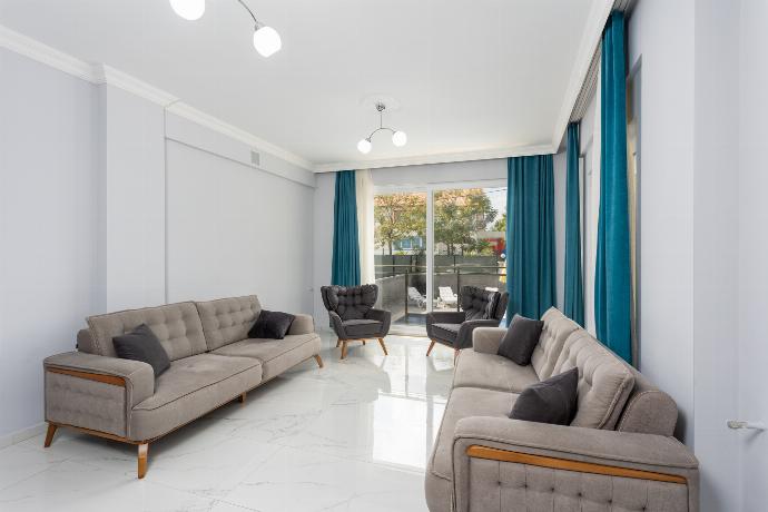 Living room with sofas, A/C, WiFi internet, and satellite TV . - Villa Sasha 2 . (Photo Gallery) }}
