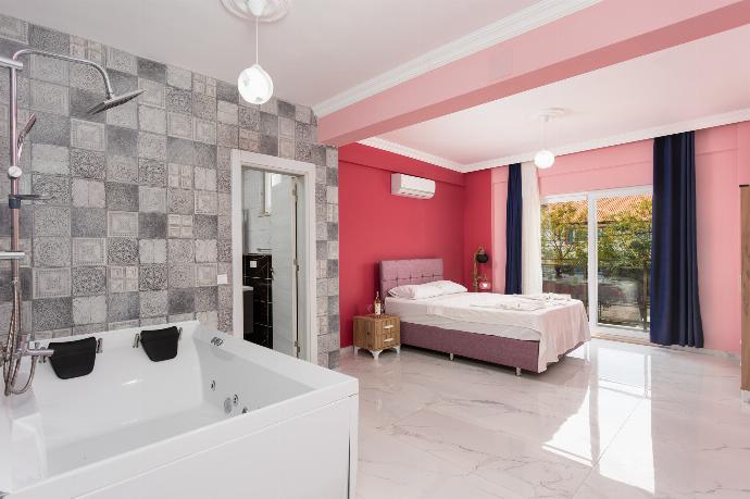 Double bedroom with en suite bathroom and A/C . - Villa Sasha 2 . (Photo Gallery) }}