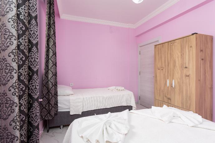 Bedroom with double bed, single bed, and A/C . - Villa Sasha 2 . (Photo Gallery) }}