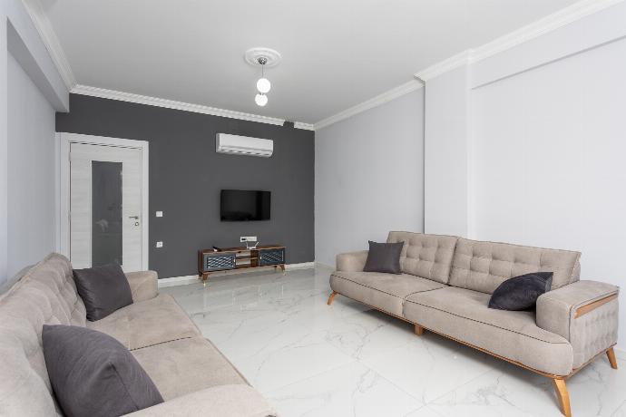 Living room with sofas, A/C, WiFi internet, and satellite TV . - Villa Sasha 3 . (Photo Gallery) }}