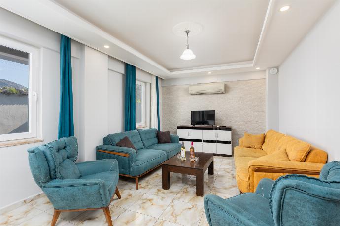 Open-plan living room with sofas, kitchen, A/C, WiFi internet, and satellite TV . - Villa Ada 1	 . (Photo Gallery) }}