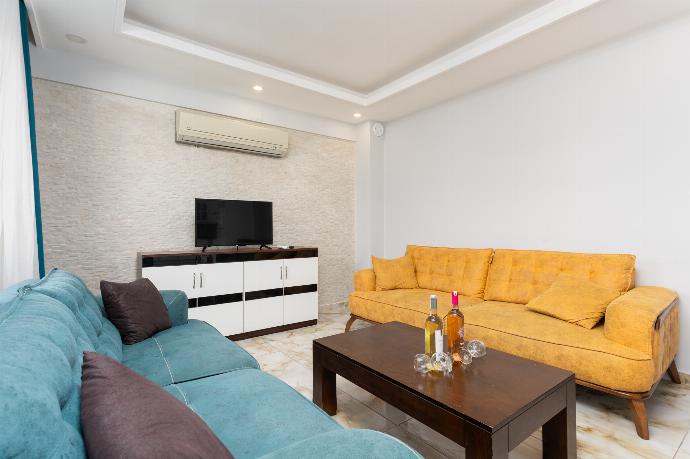 Open-plan living room with sofas, kitchen, A/C, WiFi internet, and satellite TV . - Villa Ada 1	 . (Photo Gallery) }}