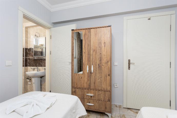 Twin bedroom with en suite bathroom and A/C . - Villa Ada 1	 . (Photo Gallery) }}