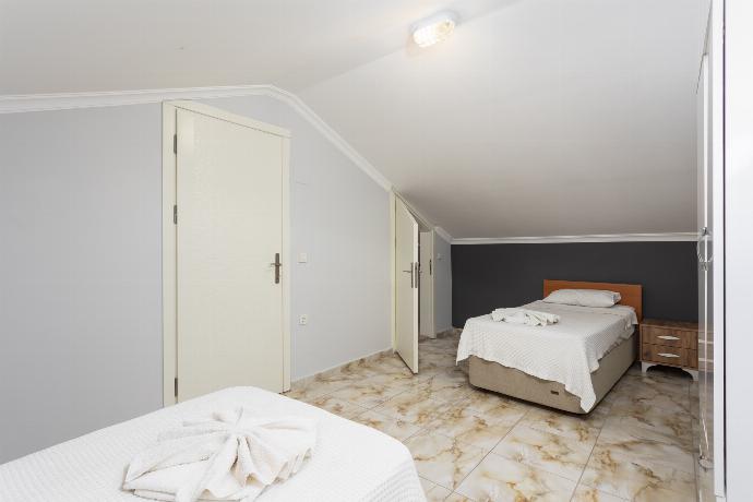 Twin bedroom with en suite bathroom and A/C . - Villa Ada 1	 . (Photo Gallery) }}