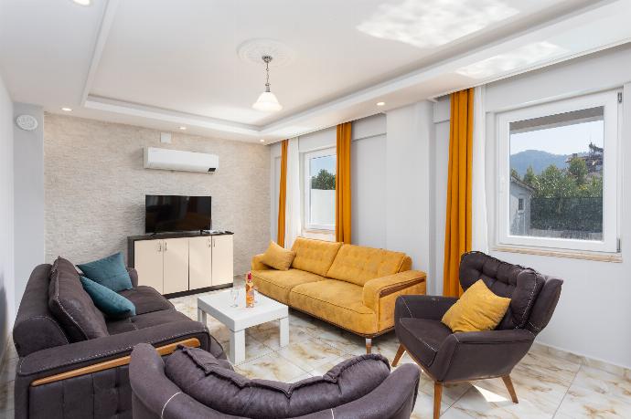 Open-plan living room with sofas, kitchen, A/C, WiFi internet, and satellite TV . - Villa Ada 2 . (Photo Gallery) }}